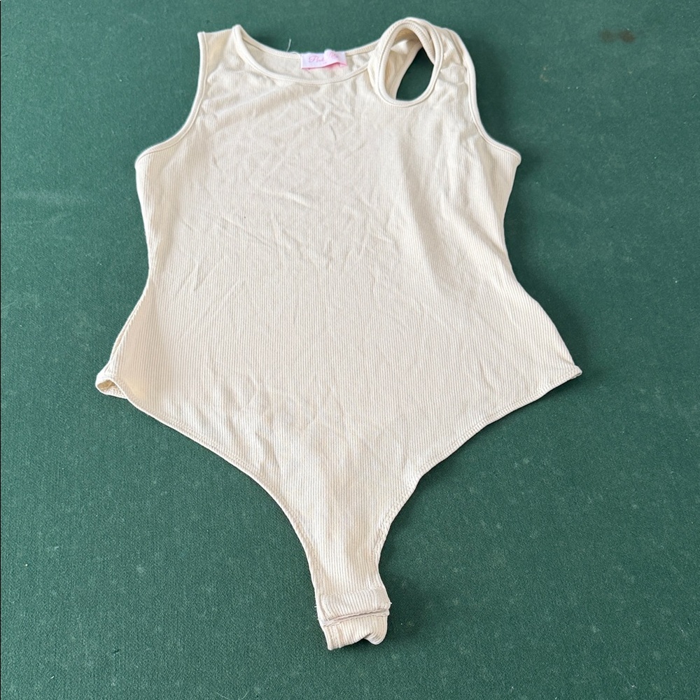 Pink Lily Cream Sleeveless Bodysuit. CAJA. #. 1 A